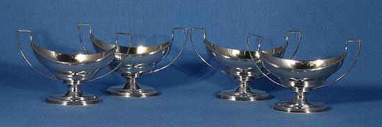 A set of four George III silver salts, by Robert & David Hennell, Length 135mm, weight 12.8oz/400grms.